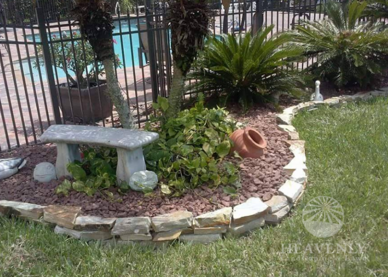 Low maintenance design with stone wall